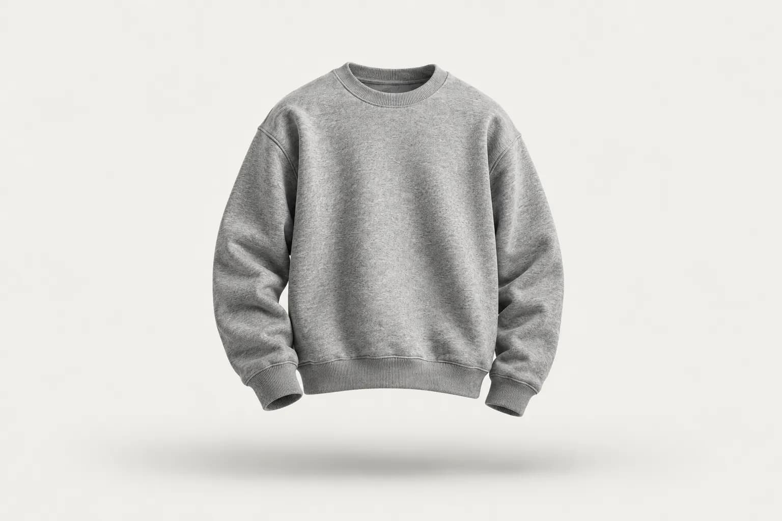Heather grey crewneck sweatshirt with ribbed cuffs and hem